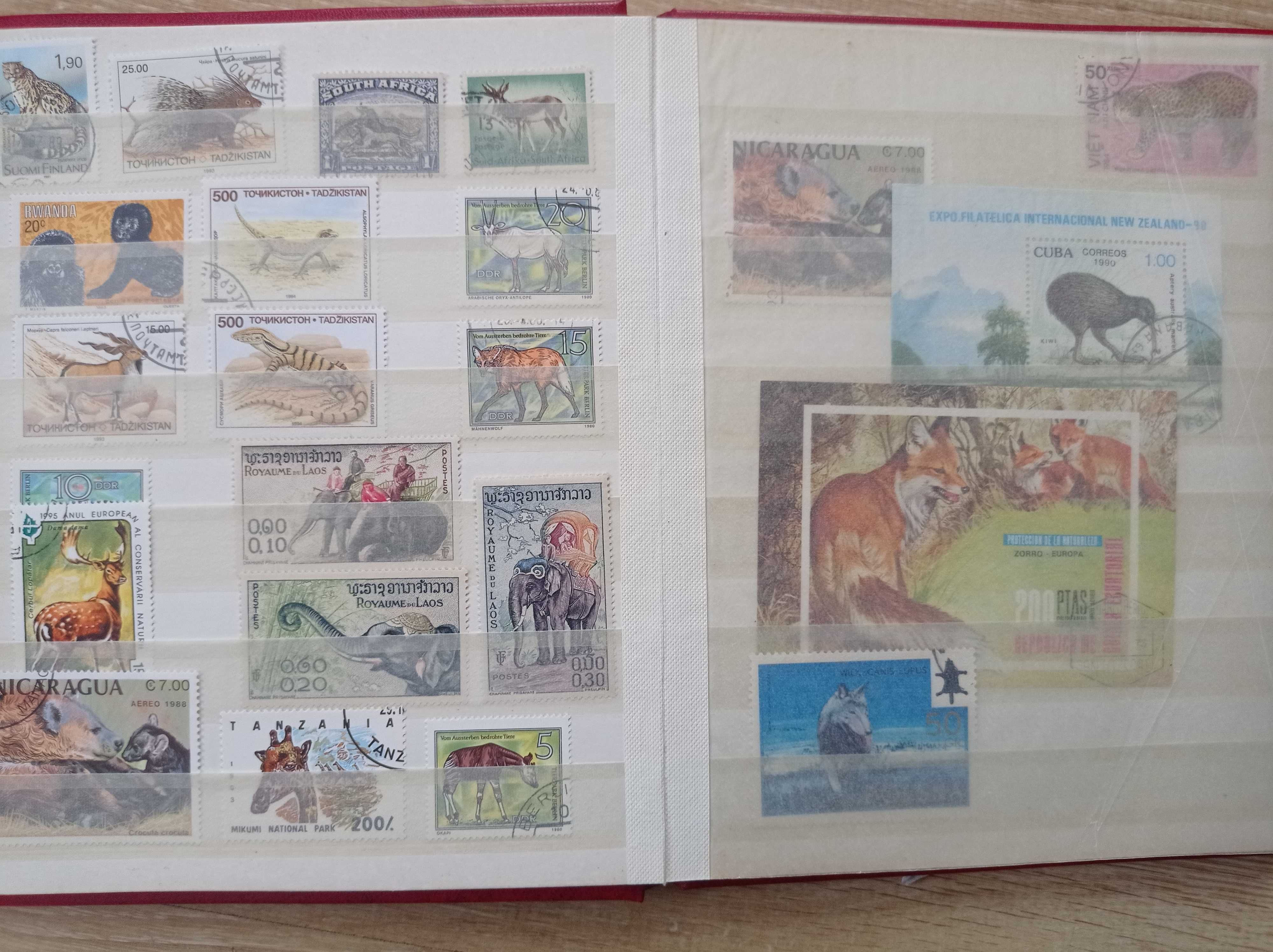 Znaczki pocztowe - Zwierzęta, ptaki - Świat -200 sztuk + klaser -6/8.