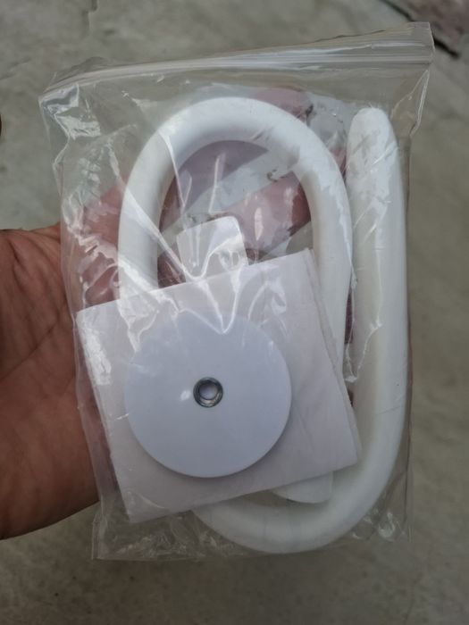 Фіксатор для двері пральної машини