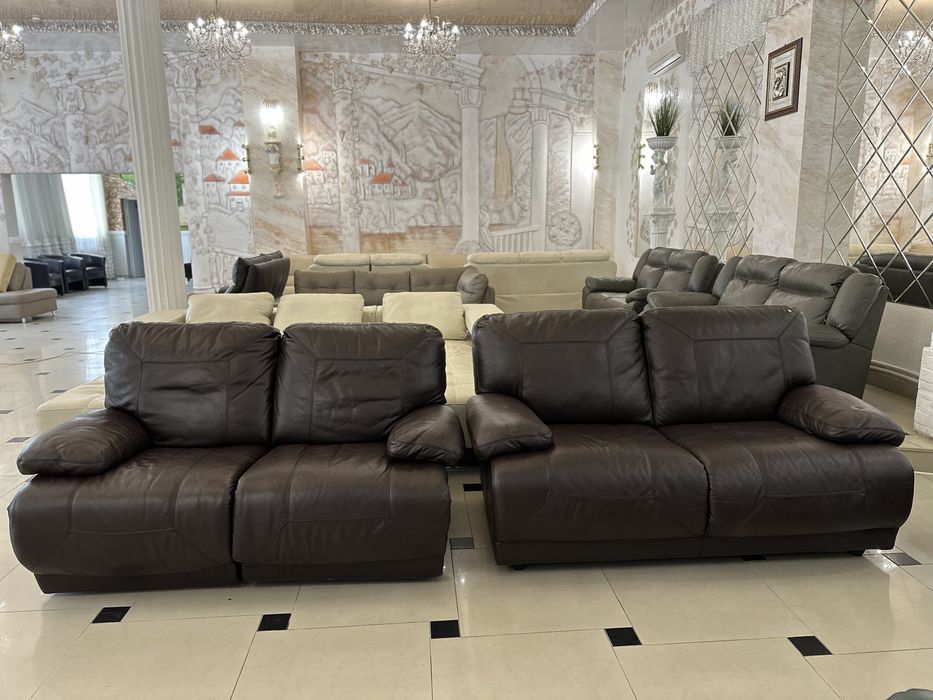 Стильні шкіряні дивани реклайнер в коричневому кольорі з Німеччини