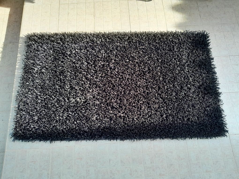 Carpetes e tapetes de fios altos