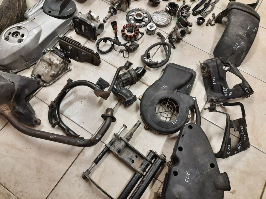 Piaggio FLY 125  3V silnik części 12-15r. Wał koło cylinder głowica