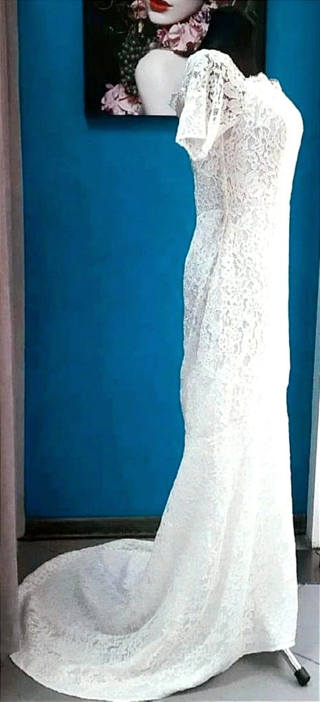 Nowa suknia ślubna z trenem