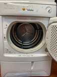Máquina de secar roupa zanussi