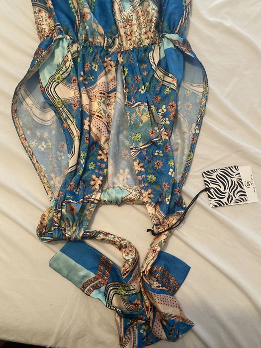 Macacão novo e com etiqueta