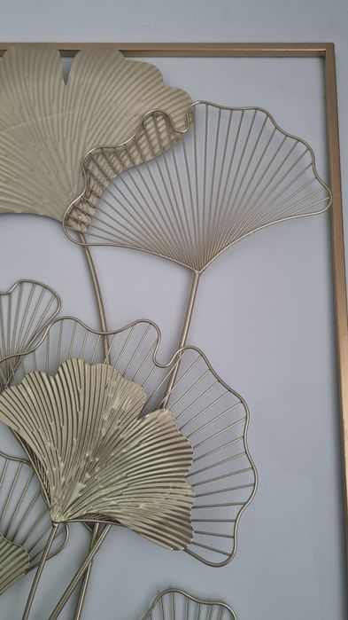 Quadro em metal dourado