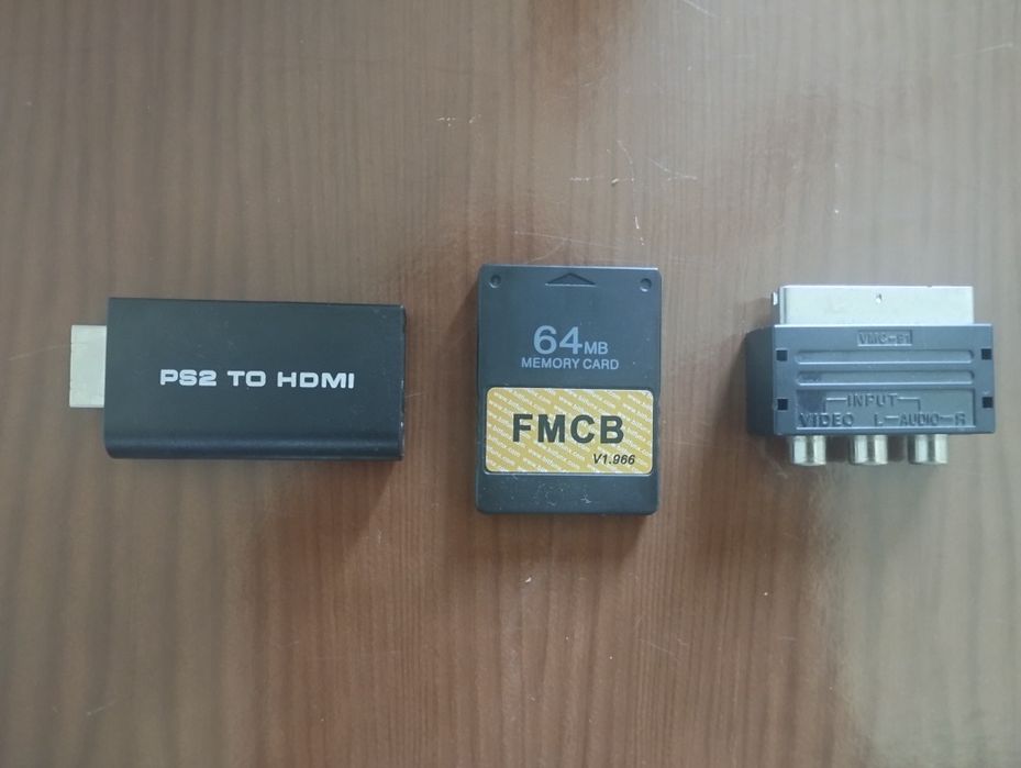 Duas PS2 como novas com comandos, cabos originais e acessórios