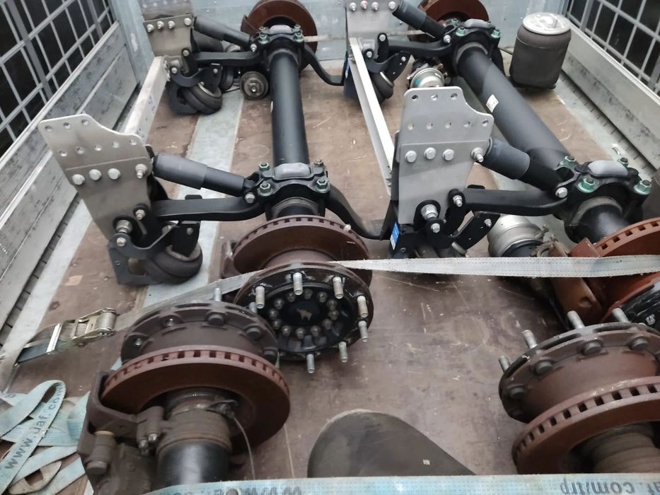 NOWE KPL. OSIE SCHMITZ, SAF, MECHANIZM PODNOSZENIA OSI