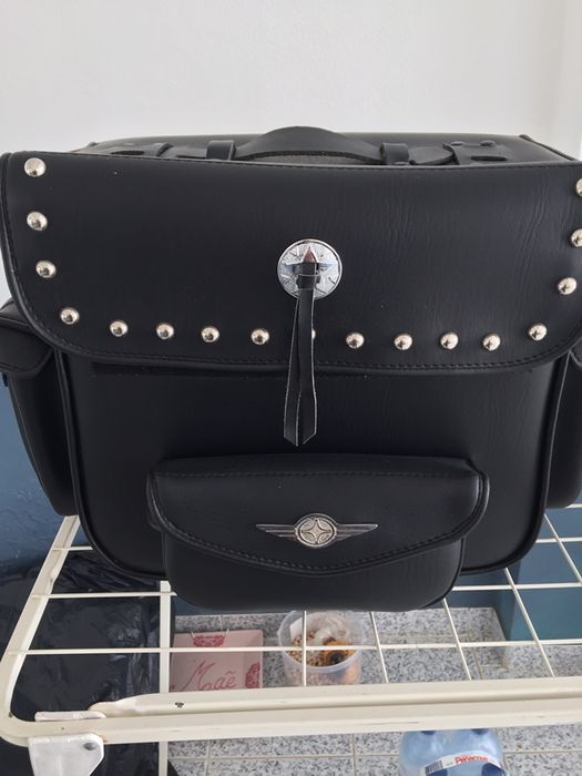 Mala de mota em pele