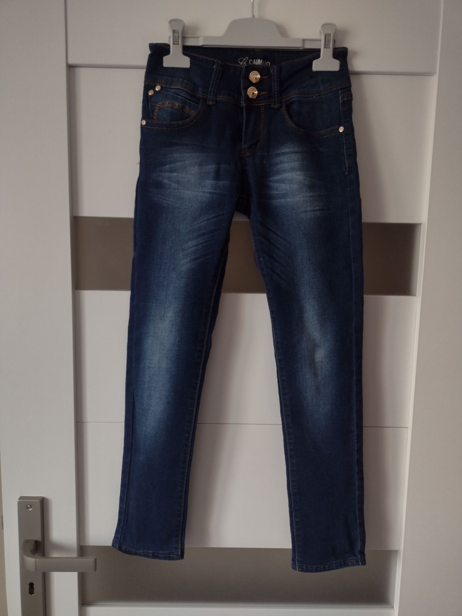 Calimaro fajne spodnie jeansowe dla dziewczynki rozmiar 140