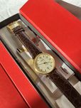 zegarek analogowy męski Tissot vintage szafir złoty skórzany elegancki