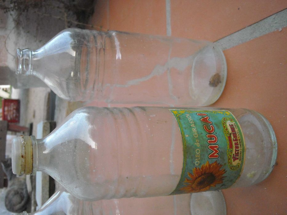 Conjunto garrafas vidro antigas litro forma original - oleo Mucai
