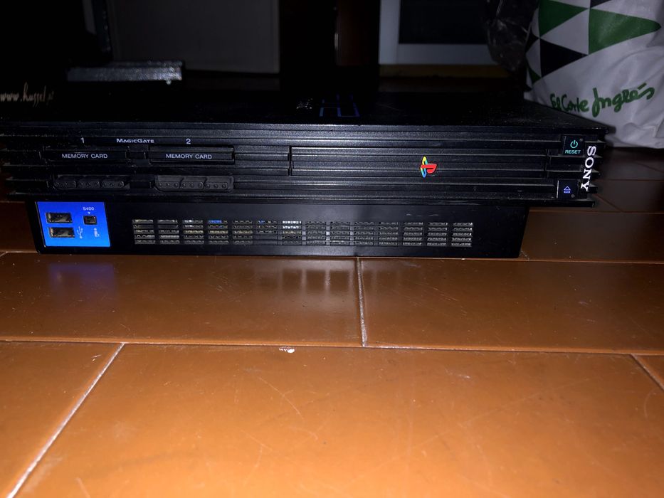 Playstation 2 + cartão memória/jogos/microfone singstar/câmara eye toy