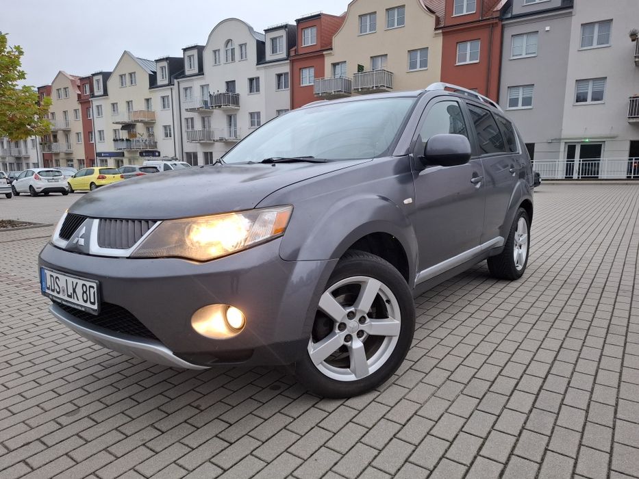 Mitsubishi Qutlander 2,4b 4X4 Klimatr Navi Alu Temp Komp 7osb zNiemiec