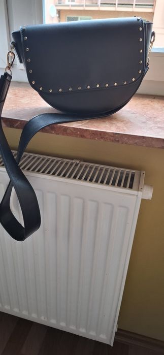 Czarna listonoszka Reserved