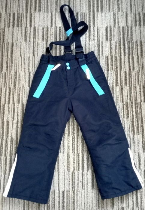 Spodnie zimowe narciarskie na szelkach granatowe ocieplane nieprzemaka
