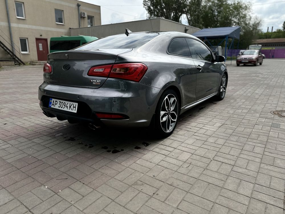 KIA Cerato Koup 1.6 T-GDi ( 204 л.с. ) 2014 год
