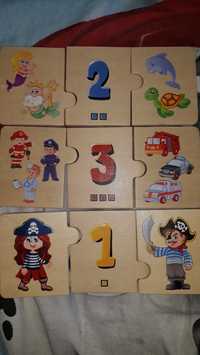 Drewniane puzzle cyfry plus obrazki do 10 

Brak jednego puzzla praweg