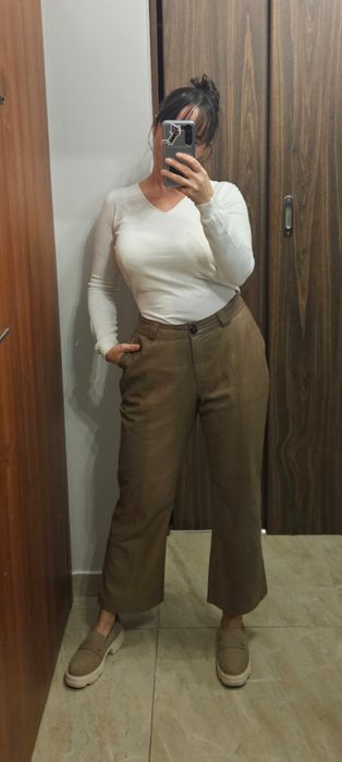 Beżowe spodnie Ochnik skórzane skóra