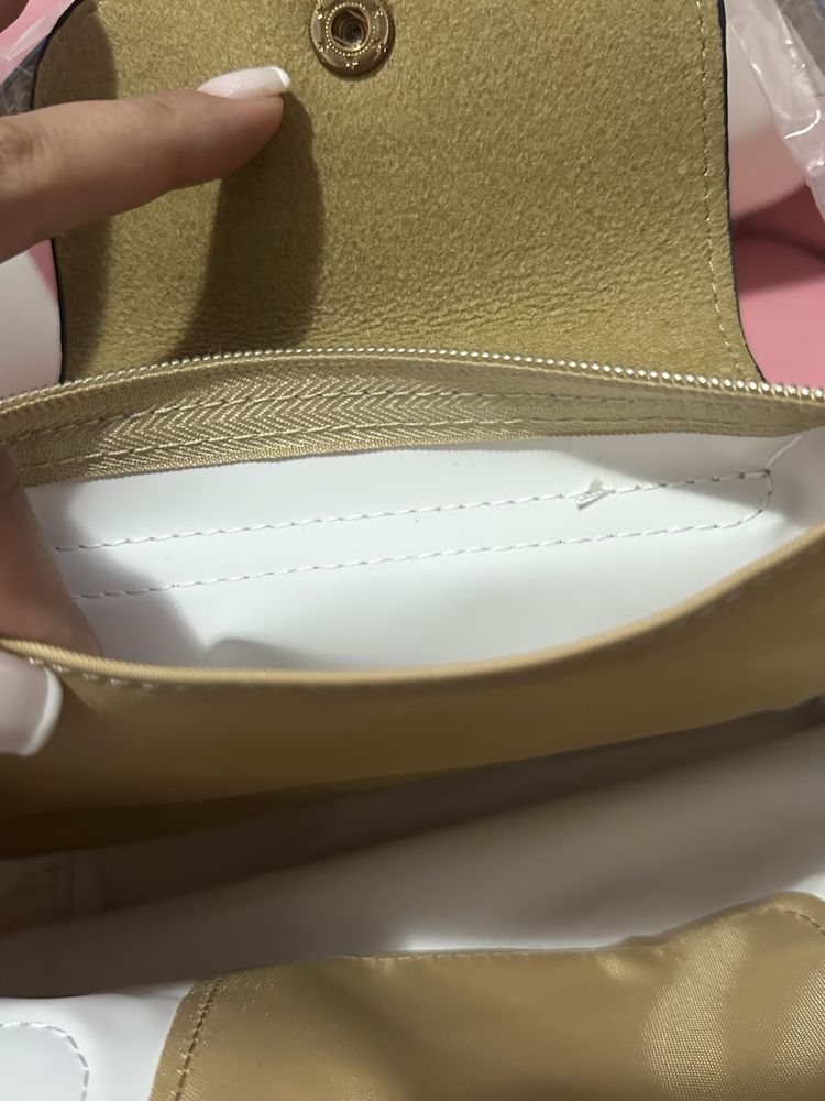 Mala Longchamp creme