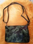 Vendo bolsa com porta moedas em pele genuína