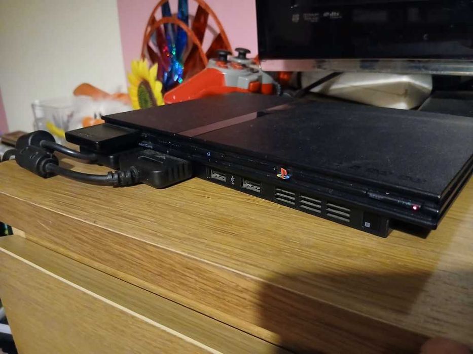 Ps2 Playstation 2 slim + 2 comandos + 20 jogos originais + c d memória