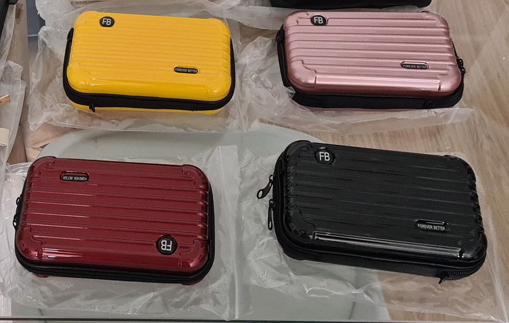 Malas/bolsas rígidas