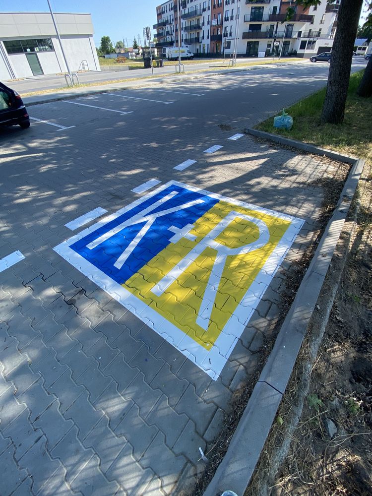 Oznakowanie poziome znaki drogowe malowanie pasów parkingów