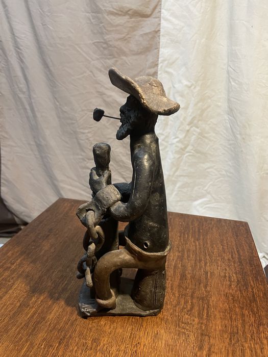 Escultura em barro cozido