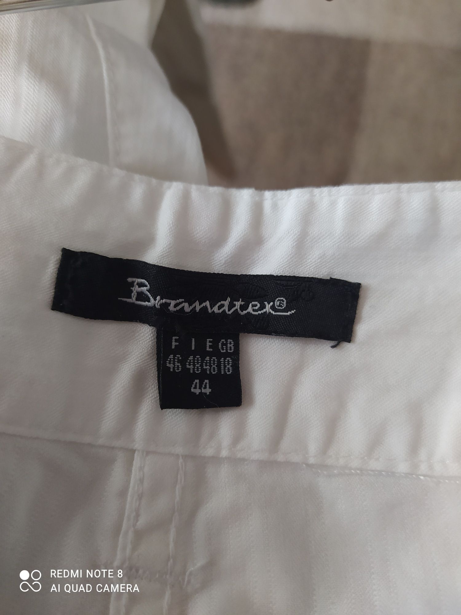 Białe bawełniane letnie spodnie, rozmiar 44