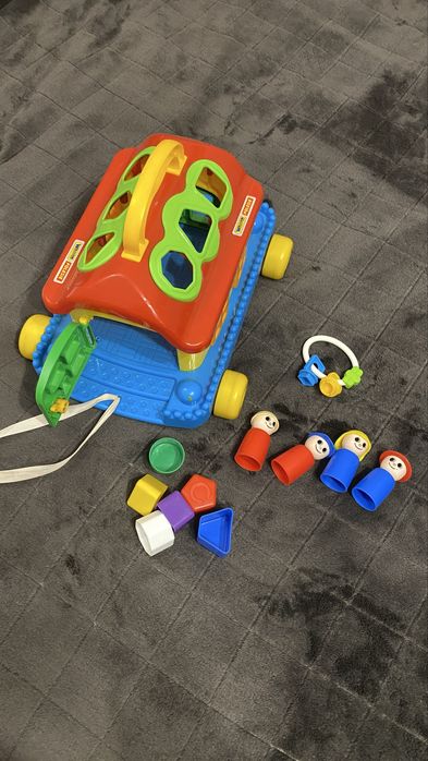 Іграшка сортер будинок на колесах