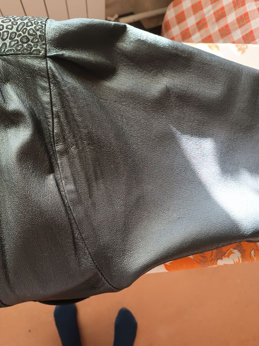 Кожаный пиджак с визерунчатыми  вставкамивставками