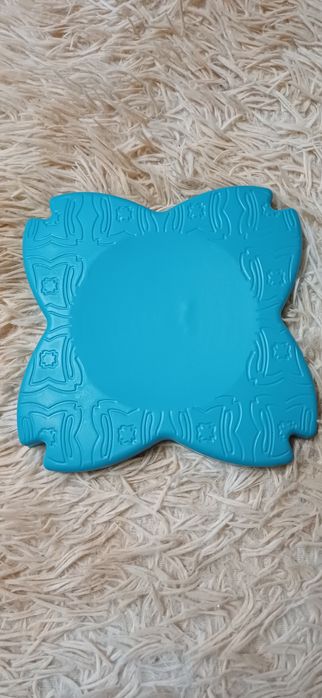 Подушка для коленей, которая используется для занятий йогой, пилатесом