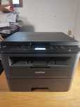Impressora multifunções Brother L2510D com toner novo