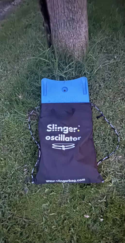Maquina de lançar bolas de tenis marca Slinger