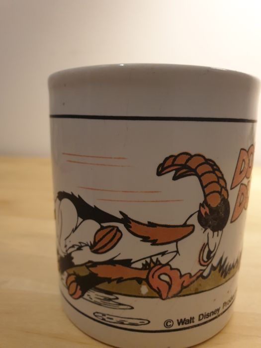 Donald Duck caneca vintage amor  é Pooh peluche warner Bros papa legua