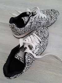 Ténis Reebok padrão Zebra