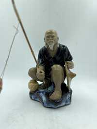 Figurka Chińczyk rybak wędkarz ryby mudman wanjiang B41/42652