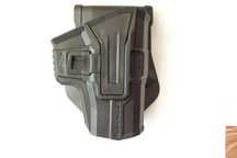 Kabura Scorpus firmy FAB Defence  do Glock, CZ75 SP-01 Shadow