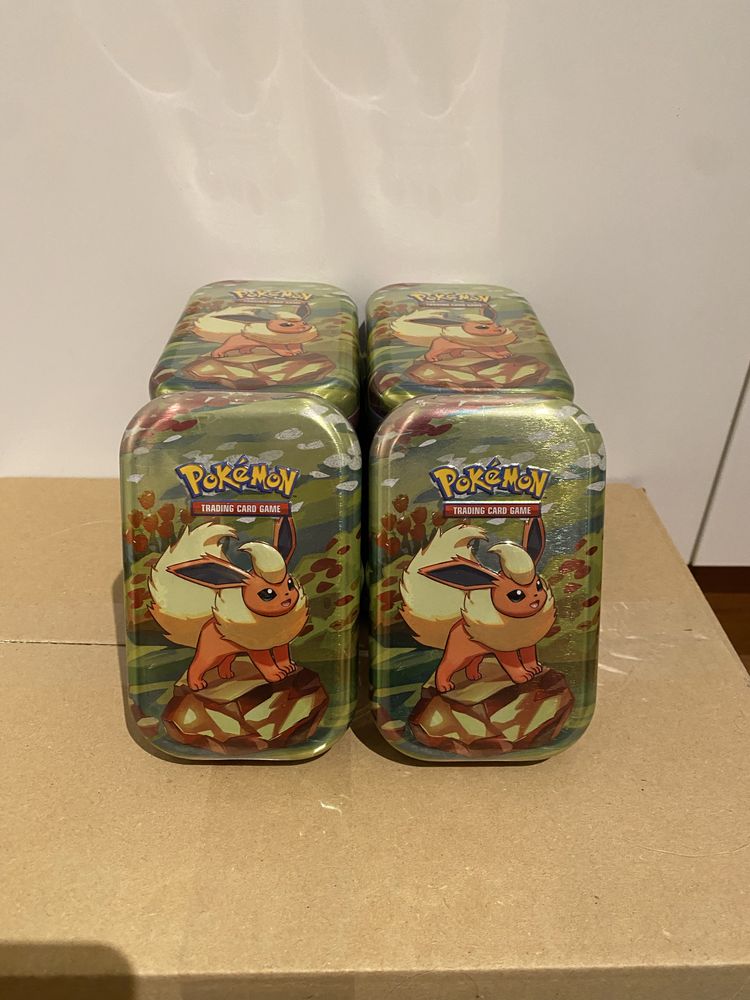 Pokemon prismatic evolutions mini tin flareon x10
