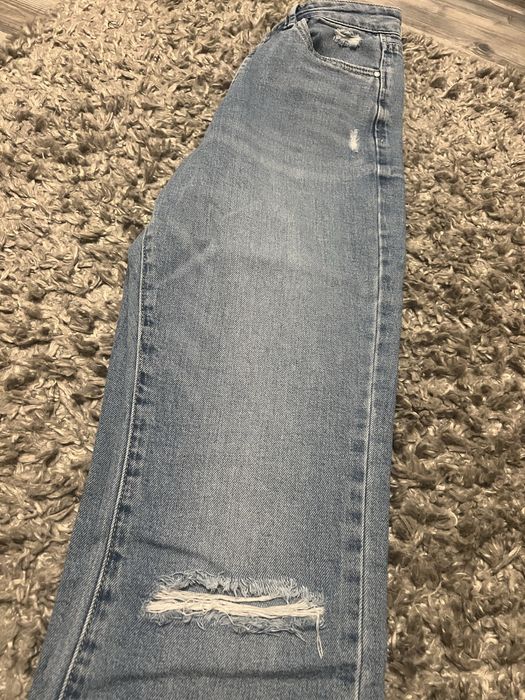 Jeansy dzwony niebieskie 36, z przetarciami
