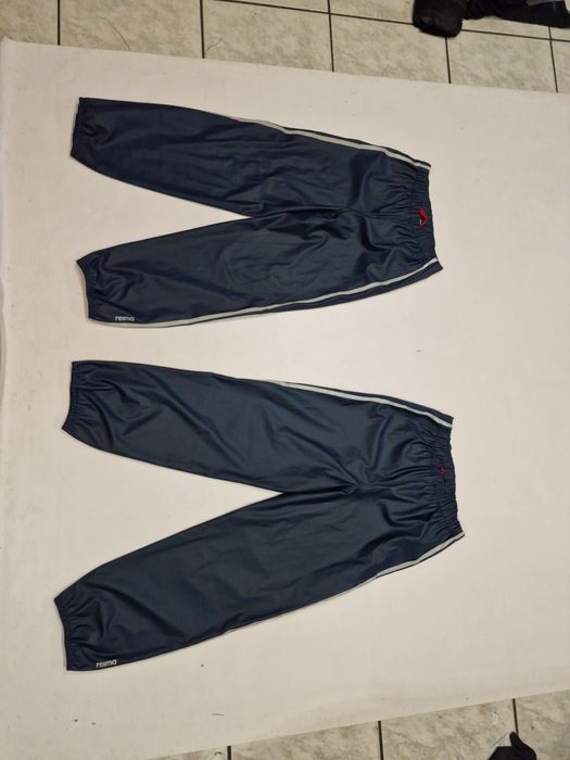 Spodnie Reima roz,146 i 140 przeciwdeszczowe turystyczne sztormiaki