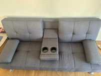 Rozkładana sofa z podłokietnikiem