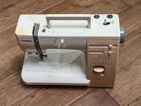 Універсальна швейна машинка Janome 415