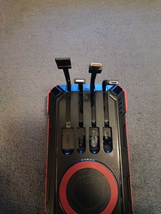 Power Bank 906511. panel solarny 31200mAh ładowarka indukcyjna 4 kable