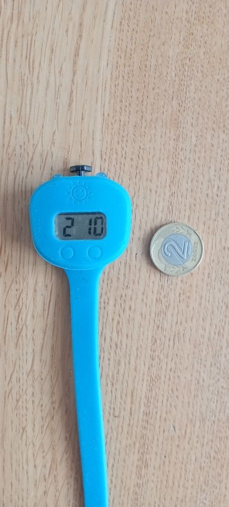 Lampka przednia do roweru z zegarkiem