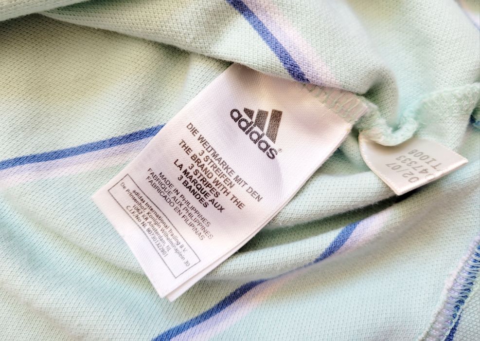 Koszulkadamska  polo miętowa Adidas pasuje na rozmiar 36/38