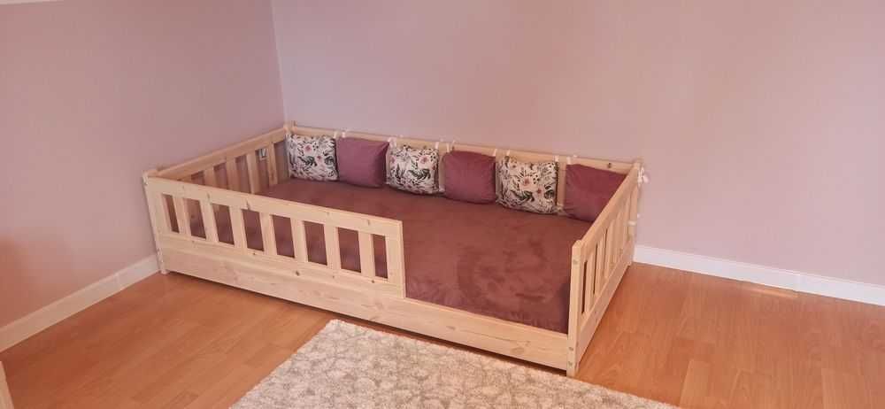 Łóżko z barierkami dla dziecka
