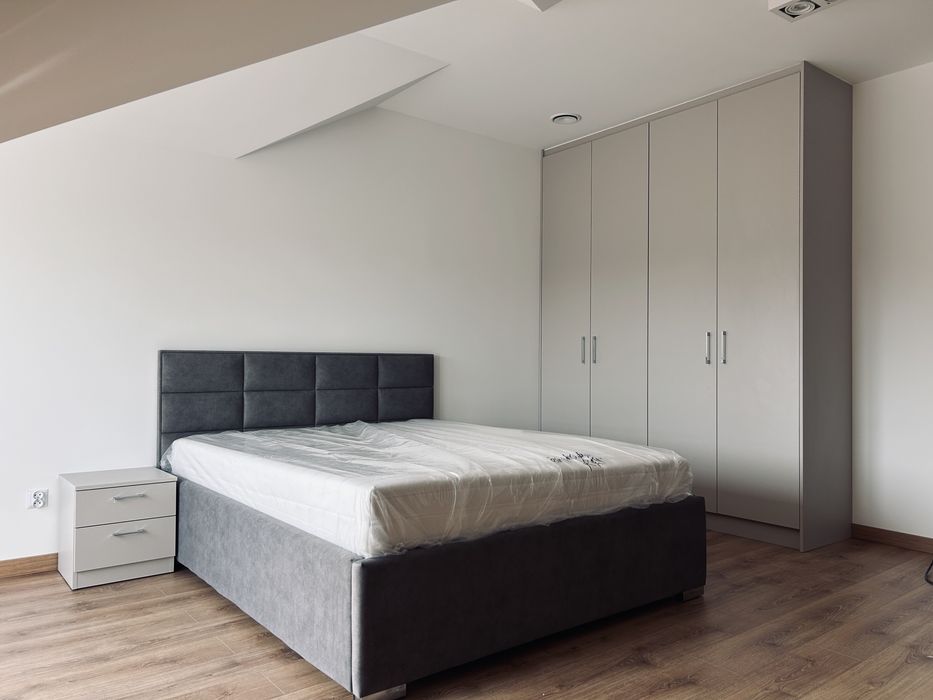 Łóżka tapicerowane na wymiar – solidne, eleganckie, nowoczesne