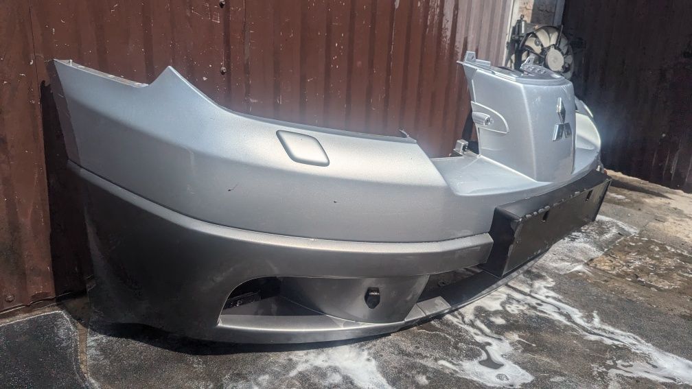 Передній бампер mitsubishi outlander MR971529