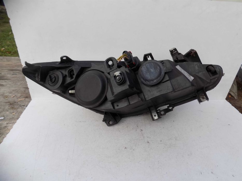 Reflektor lampa przód lewa Peugeot 307 lift 05-08 Europa soczewka